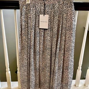 Long light pink leopard skirt size 6.